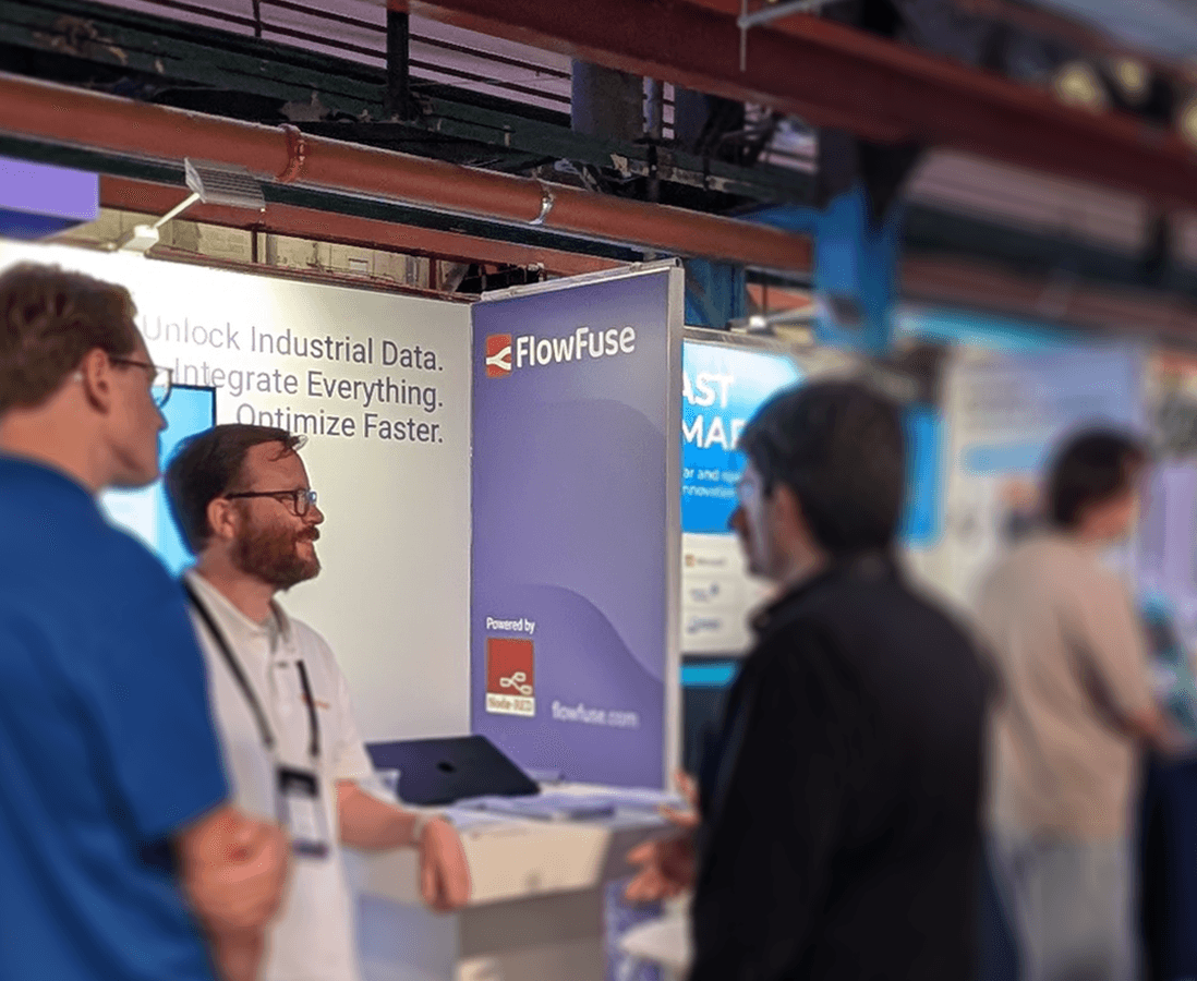 Image of people at the FlowFuse booth